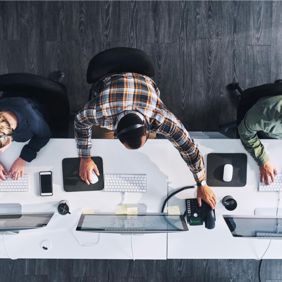 People working at an office desk