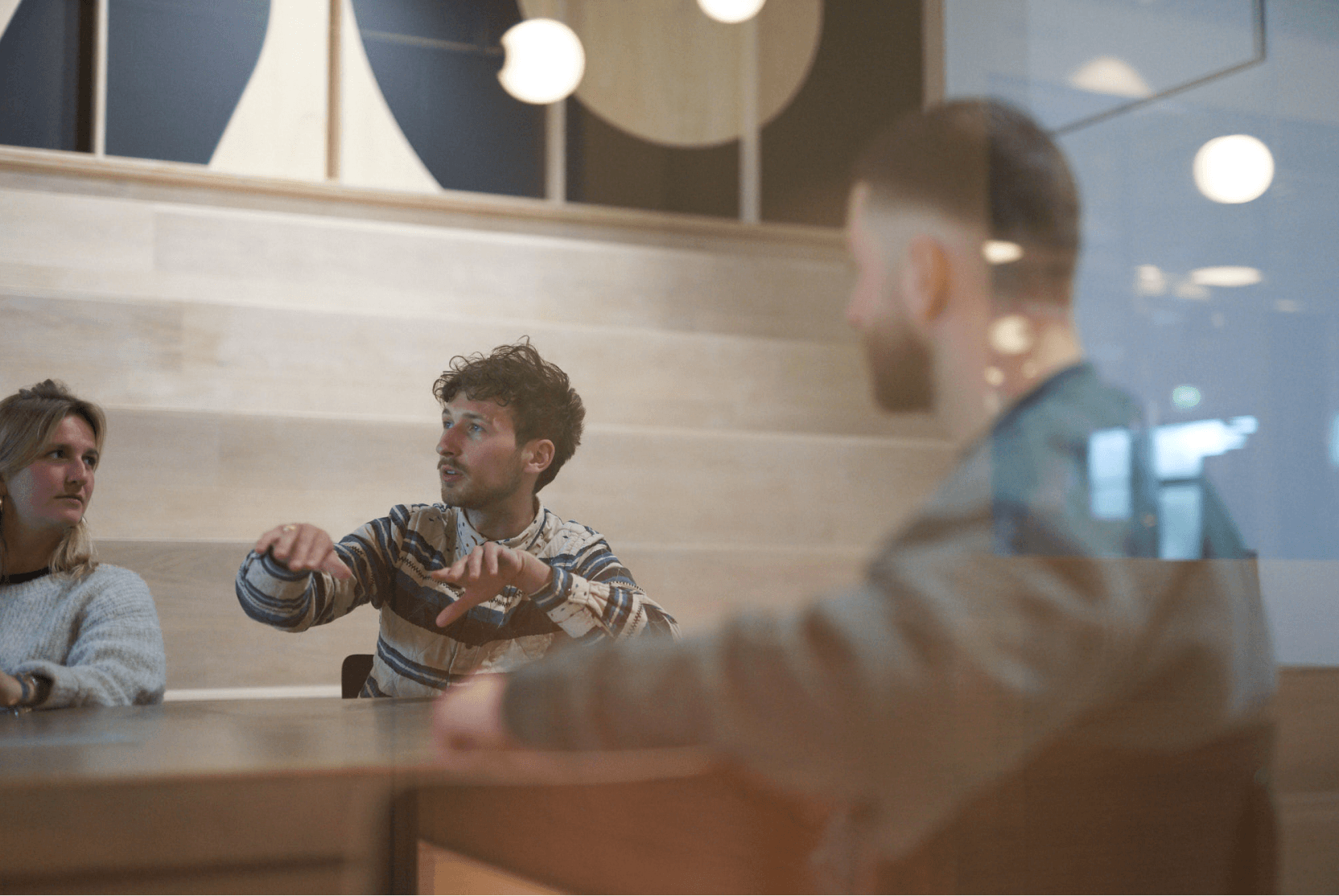 People discussing at a table