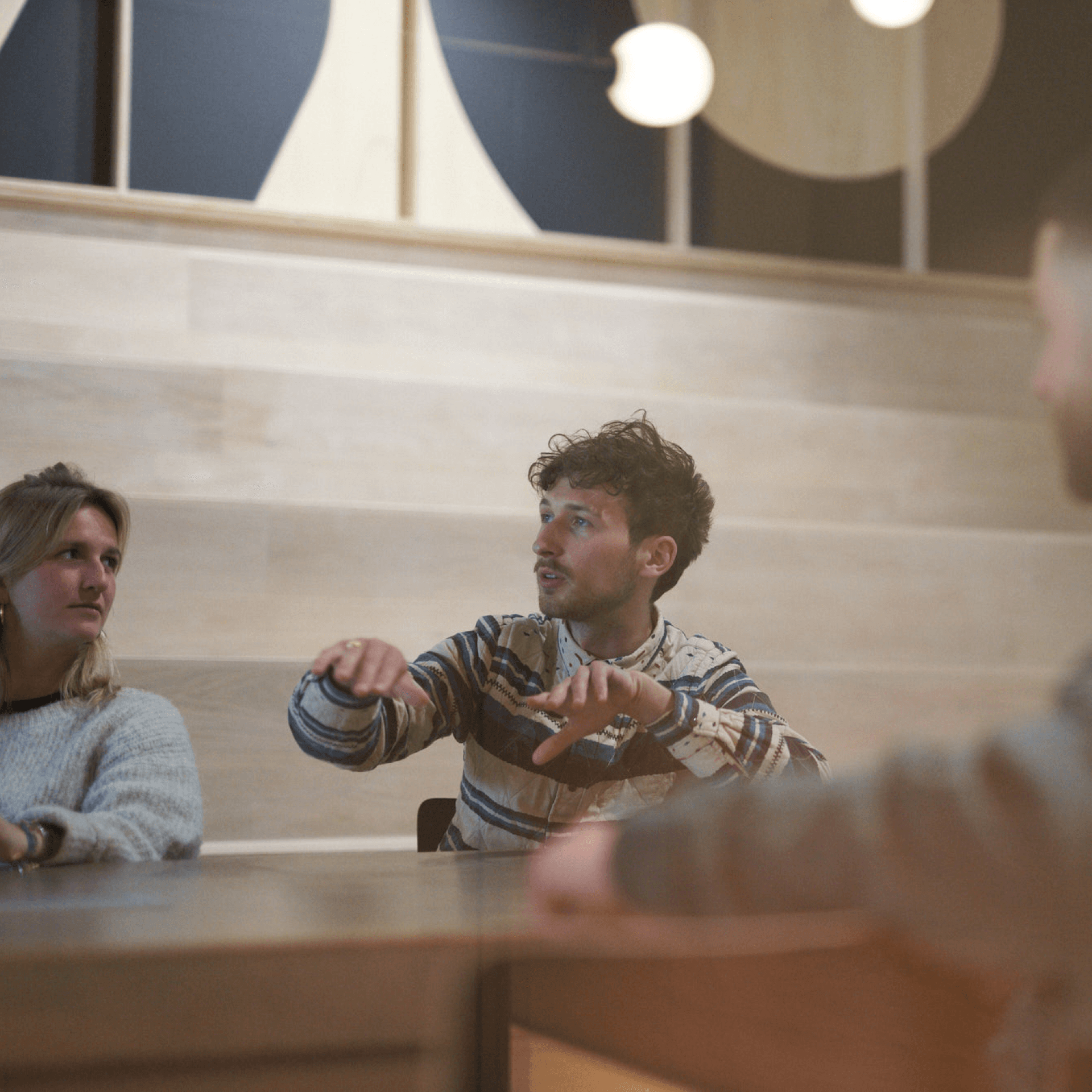 People discussing at a table