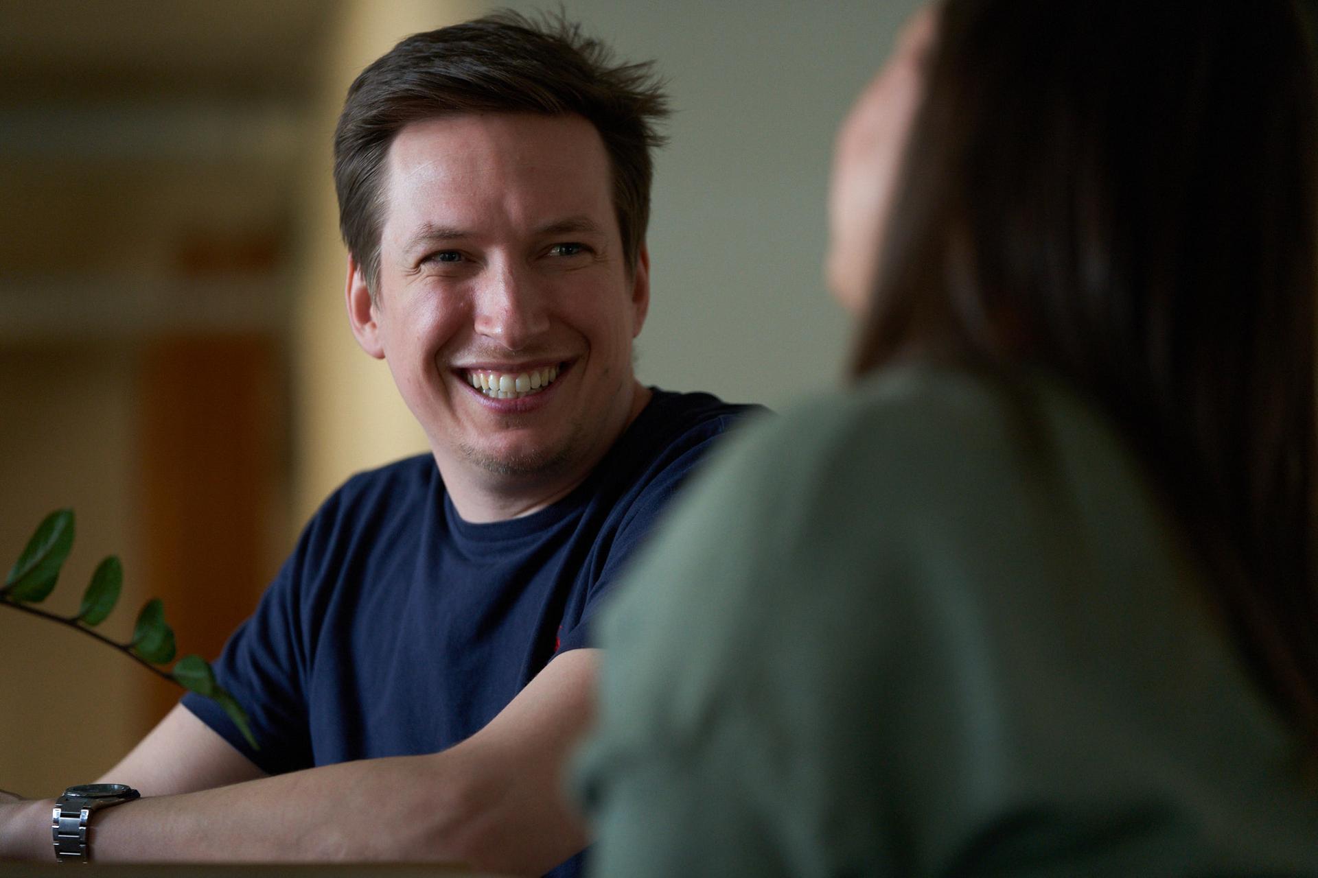 Colleague smiling at iO office