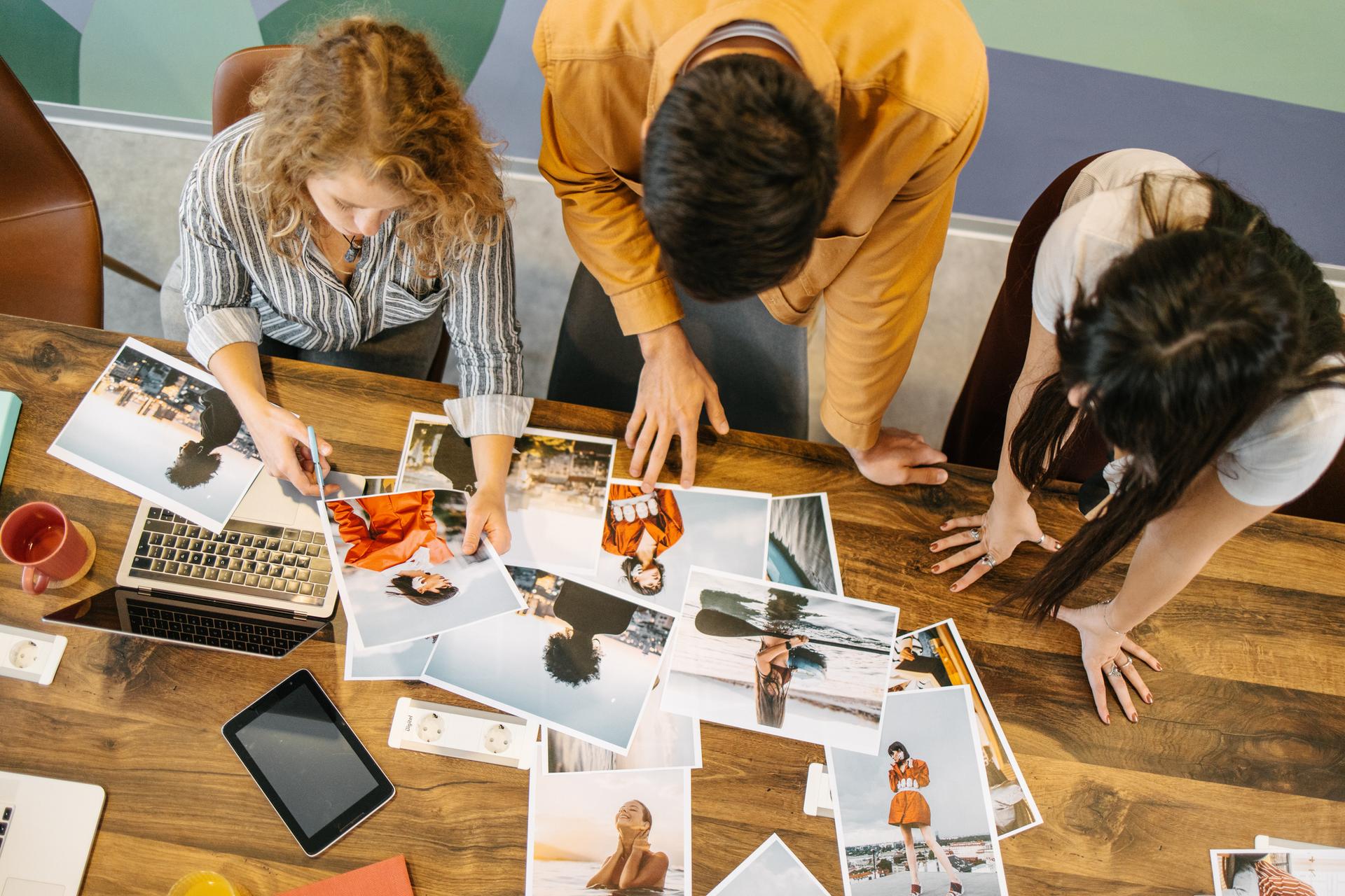 people working selecting images