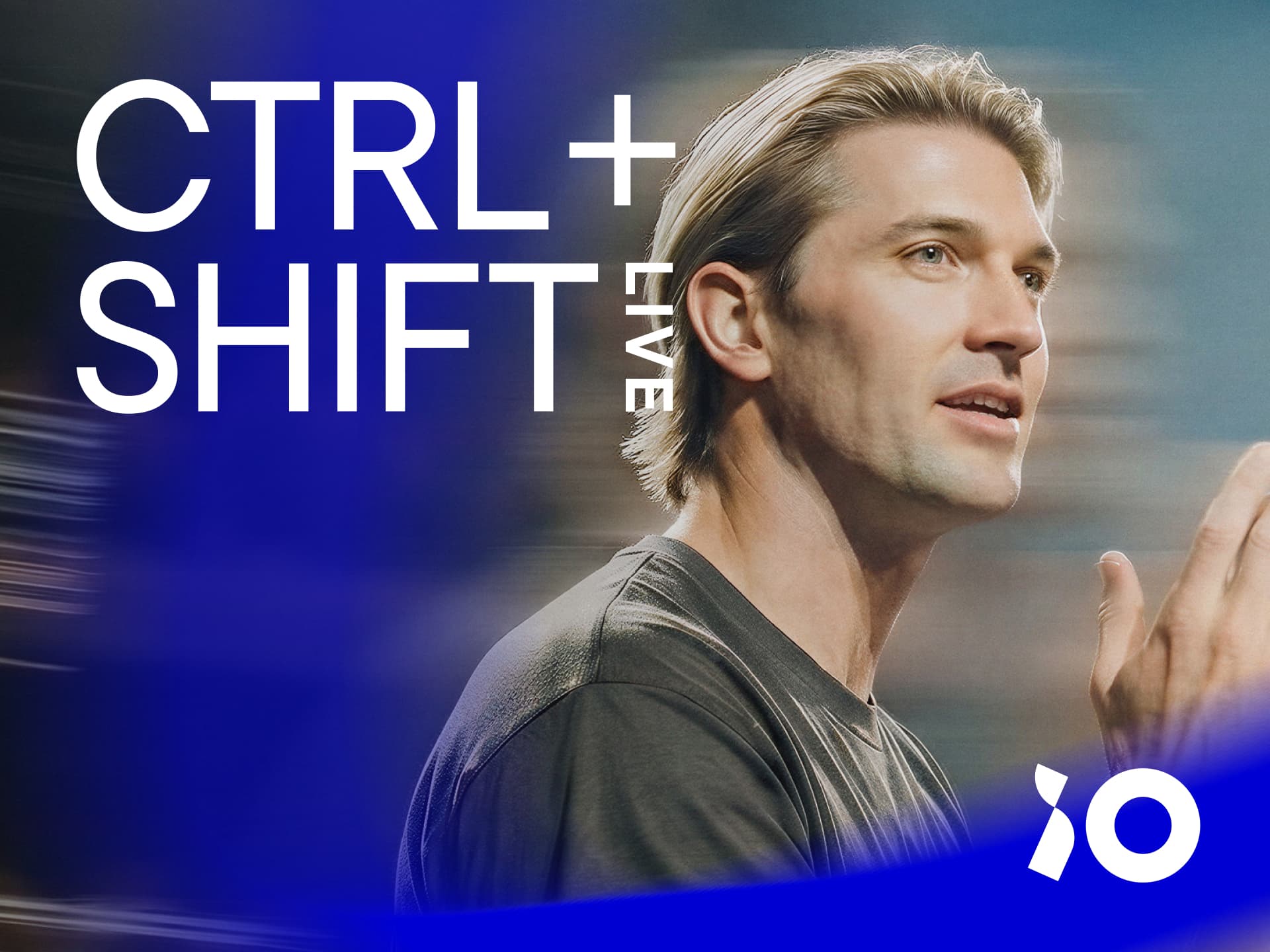 Person speaking in front of a blurred background with CTRL + SHIFT Live text